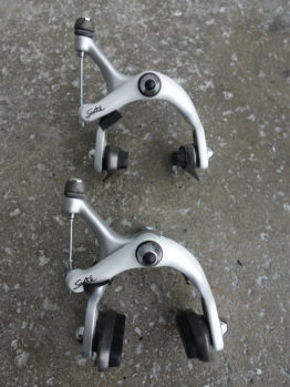 Very rare Shimano Sante brake caliper set from the 1980s with silver and white