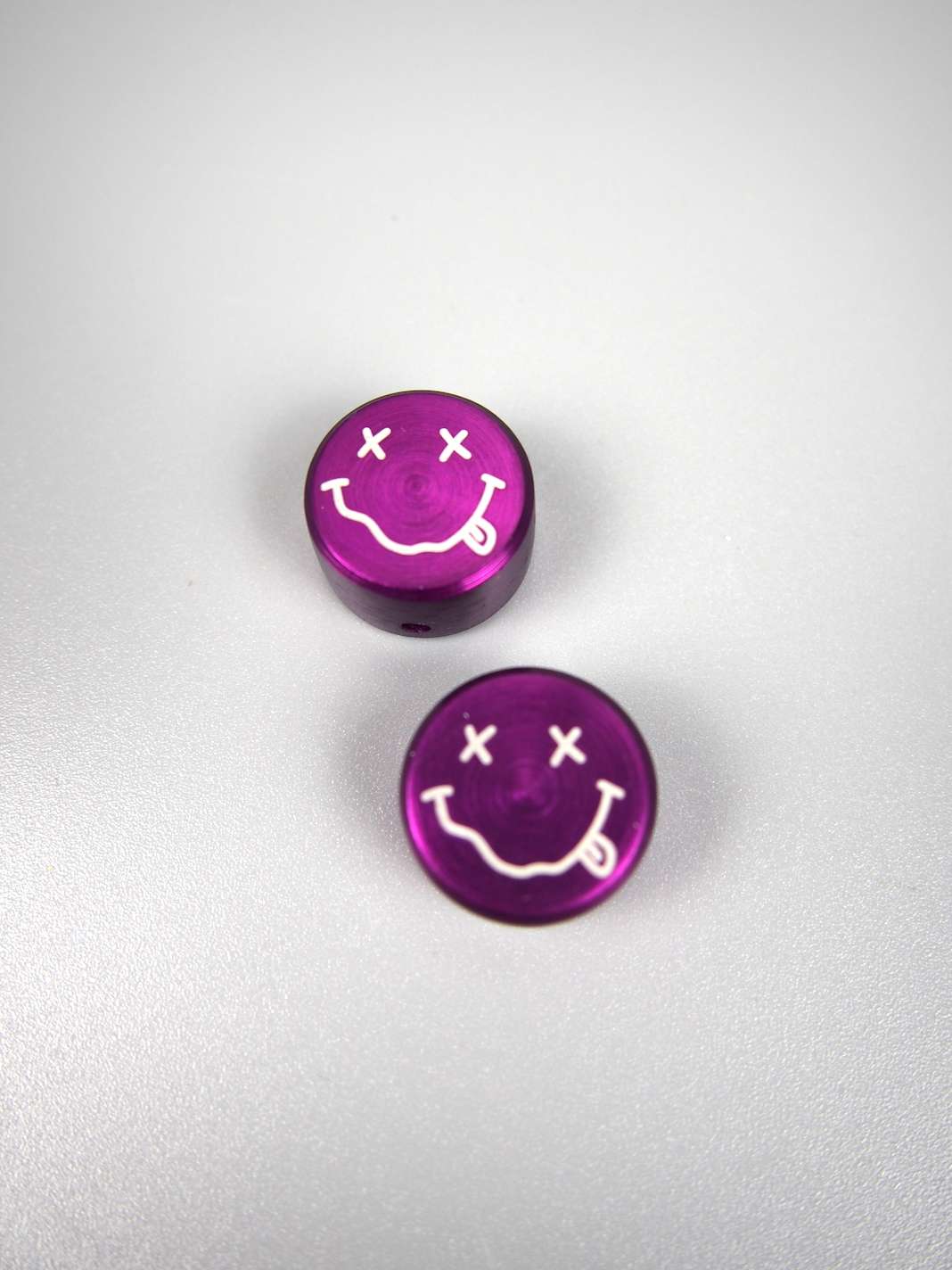 Smiley face cantilever cable hangers – Purple