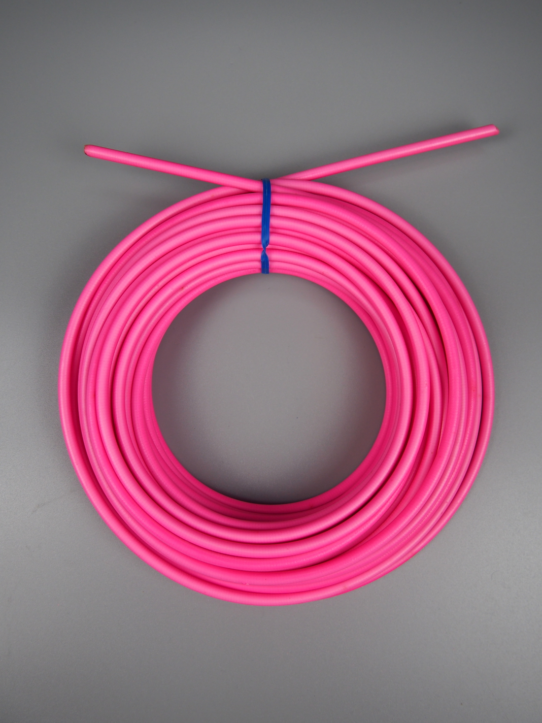 Neon brake outer cable by the metre – Neon pink