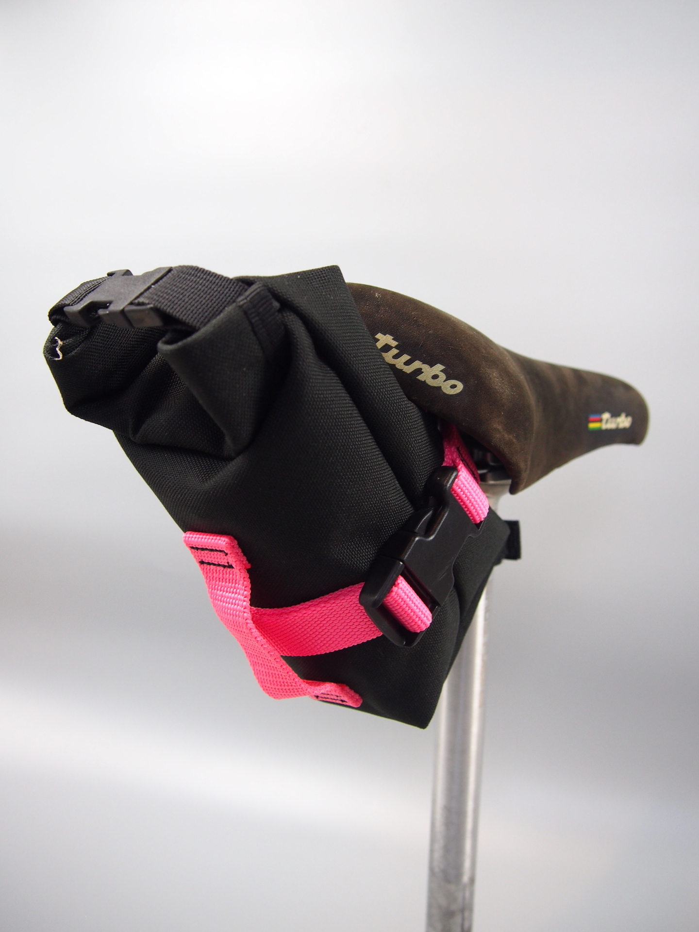 Handmade compact roll-top seat pack – Black & neon pink