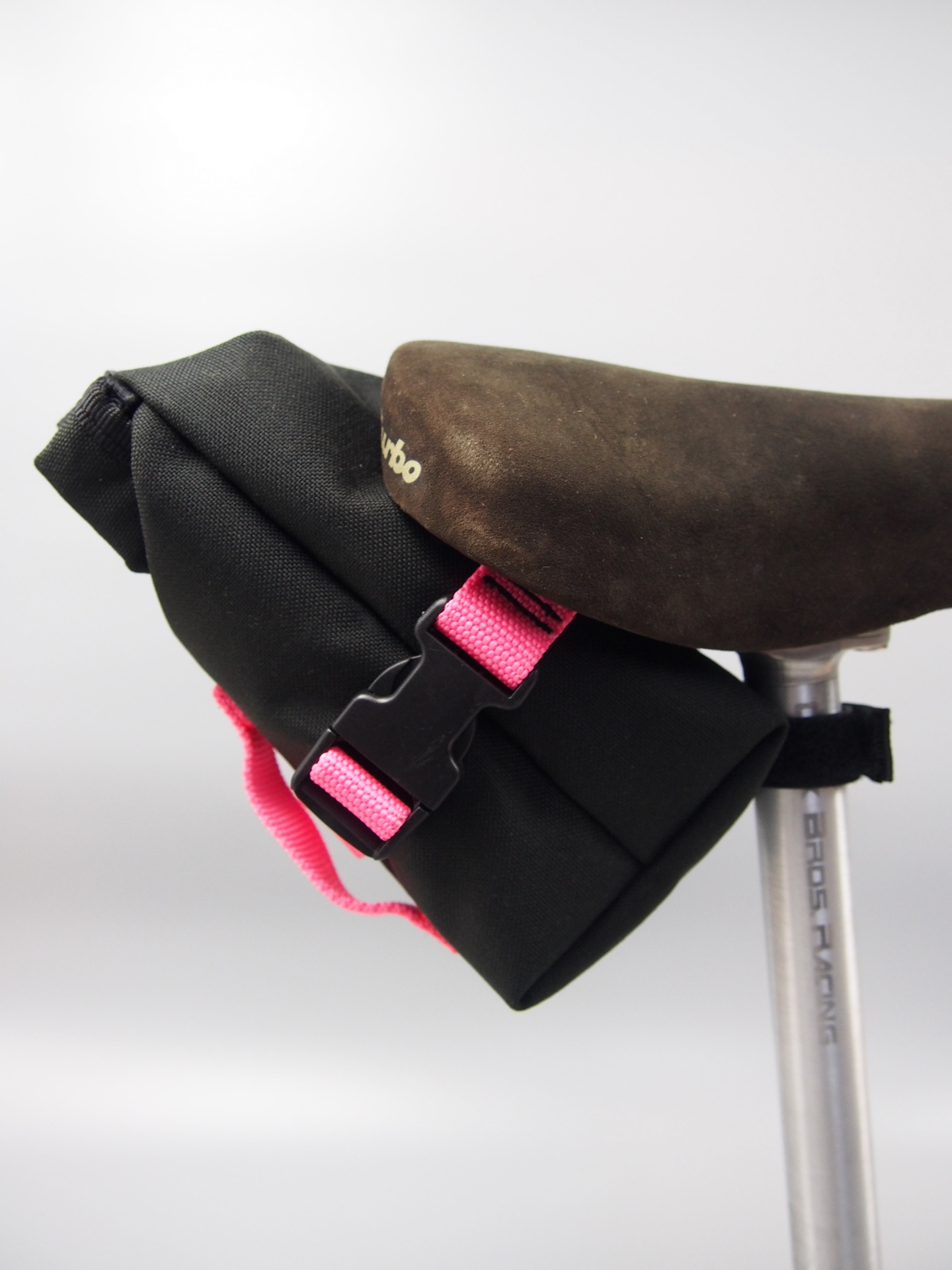 Handmade compact roll-top seat pack – Black & neon pink