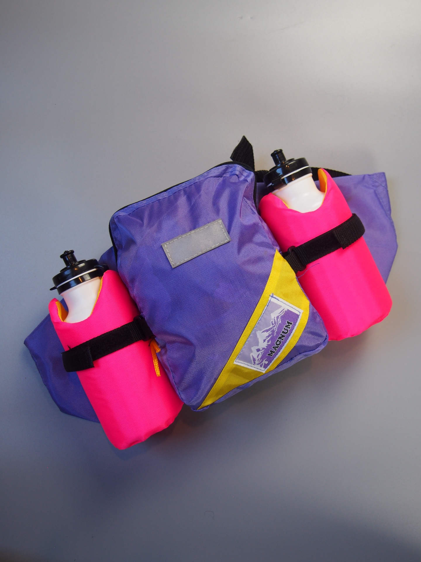 Raleigh Pioneer Pak handlebar / bum bag – Purple / Neon pink 3 Raleigh Pioneer Pak handlebar / bum bag – Purple / Neon pink